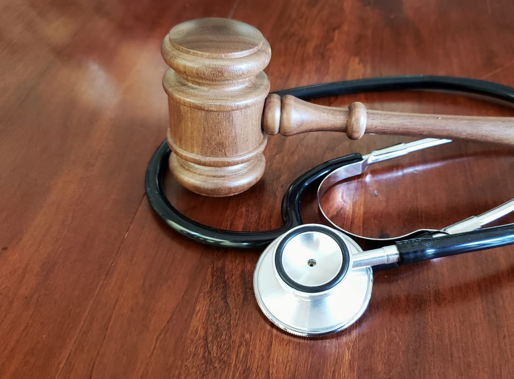 law gavel and doctor's stethoscope