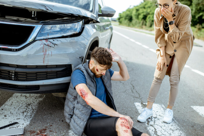 woman-driver-with-injured-man-on-the-road-e-orum-young-law-monroe-la-71201